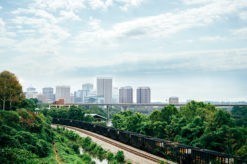 richmond skyline photo with train tracks and hiking trail in the foreground