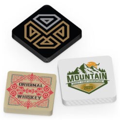 stacks of custom printed square stickers with rounded corners