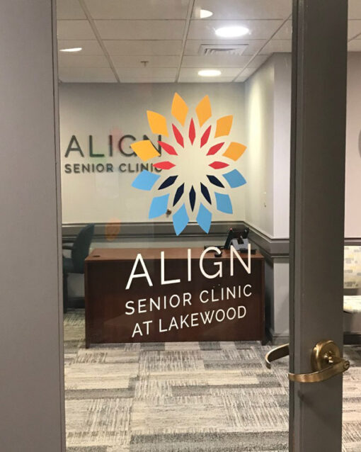 custom cut vinyl logo decal on glass door